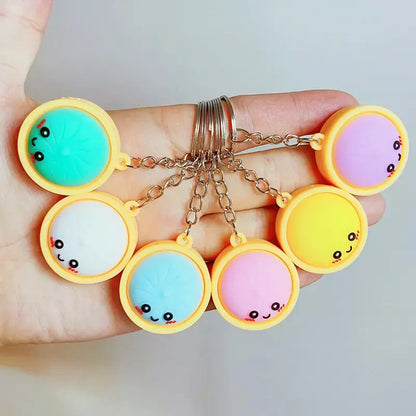 Squeeze Away Stress with the Light-Up Dumpling Fidget Keychain! (6-pack)