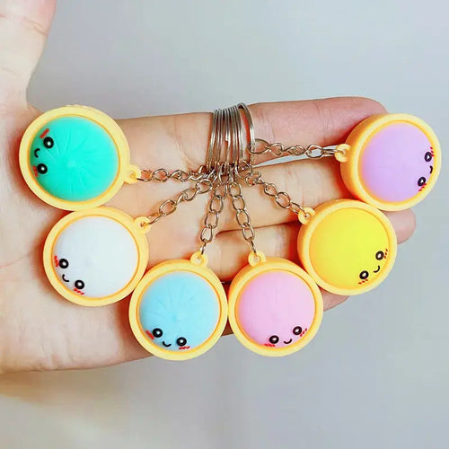 Squeeze Away Stress with the Light-Up Dumpling Fidget Keychain! (6-pack)