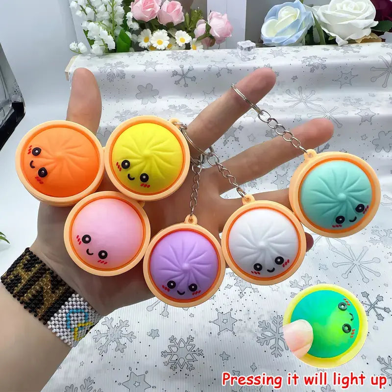 Squeeze Away Stress with the Light-Up Dumpling Fidget Keychain! (6-pack)