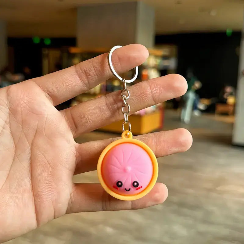 Squeeze Away Stress with the Light-Up Dumpling Fidget Keychain! (6-pack)